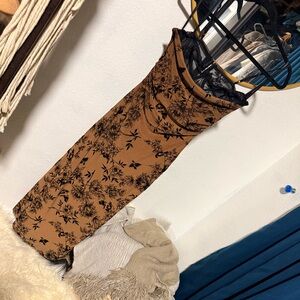 Elegant Strapless Dress with Black Floral Pattern